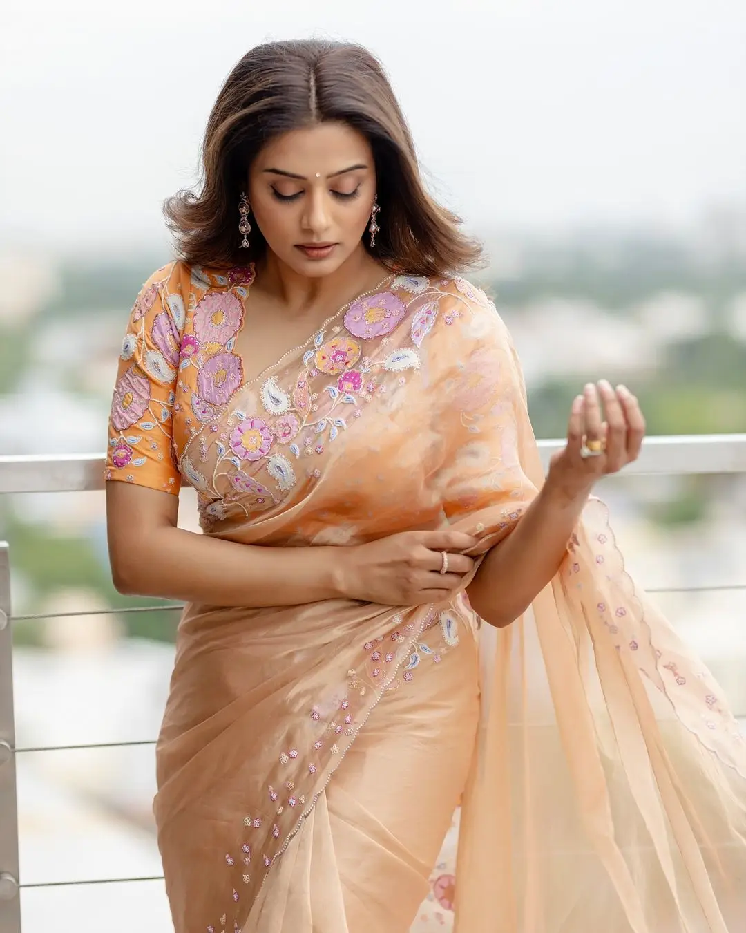 PRIYAMANI MESMERIZING LOOKS IN BEAUTIFUL DESIGNER ORANGE SAREE 2